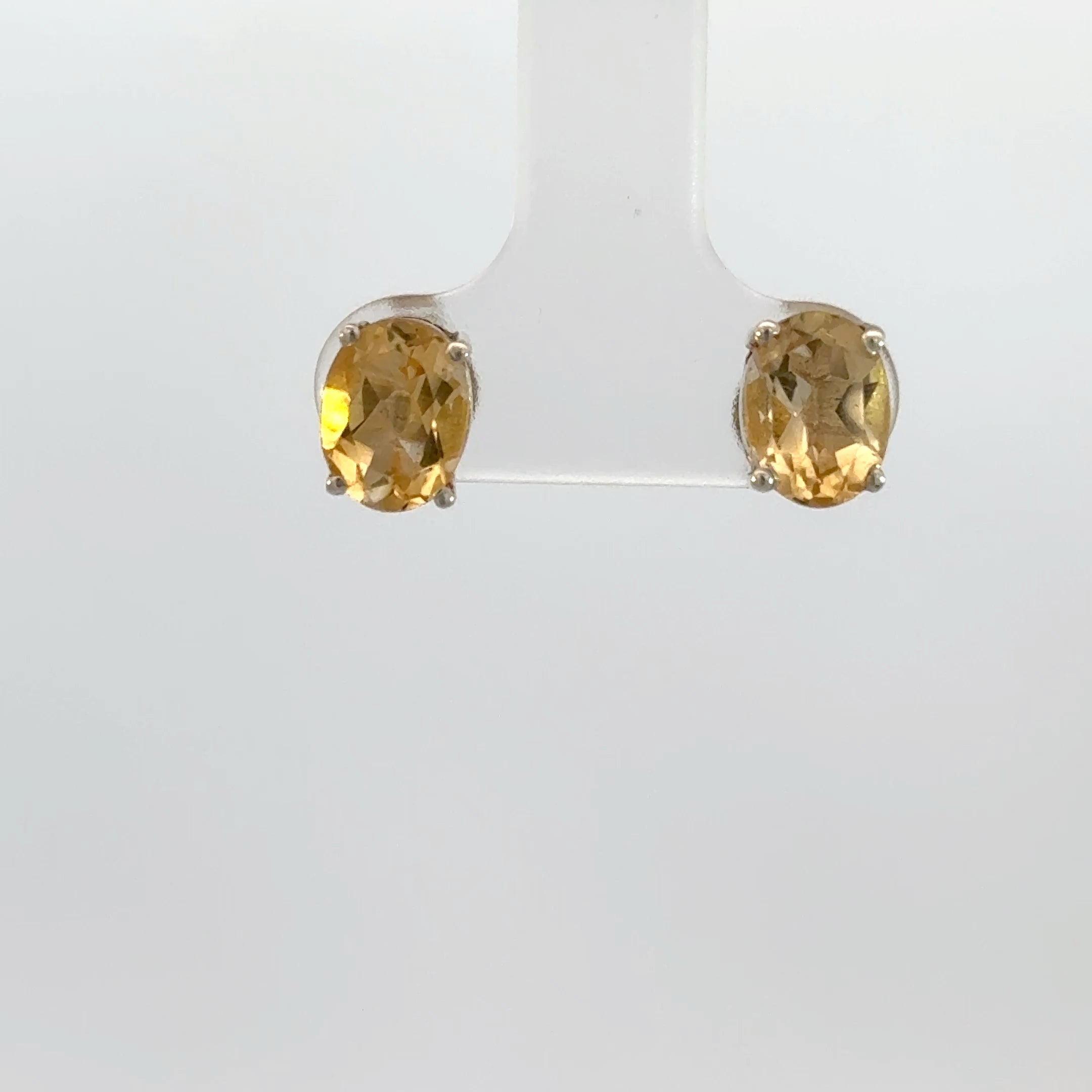 Oval Cut Citrine Stud Earrings in Sterling