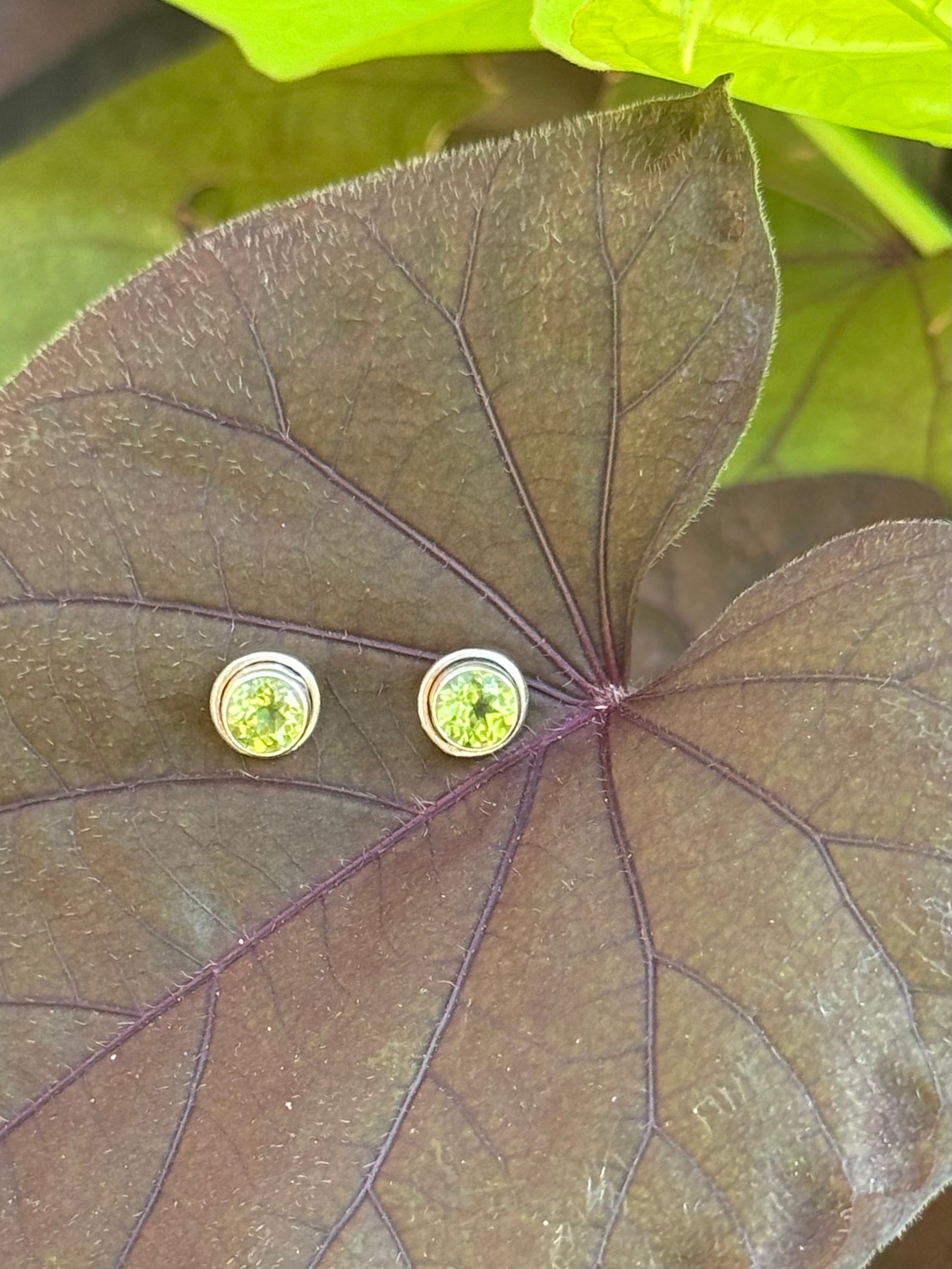 Round Cut Peridot Stud Earrings in Sterling Silver