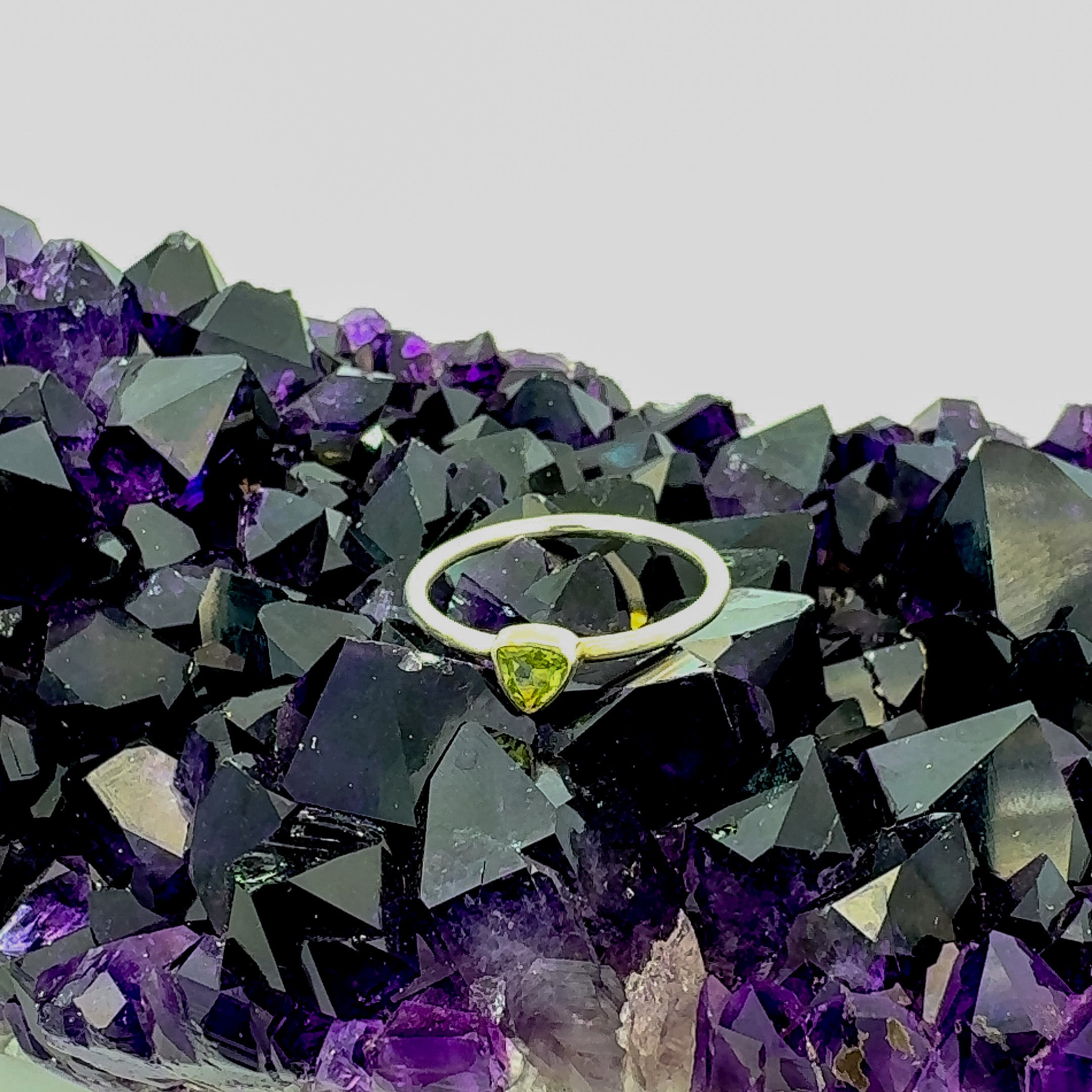 Trillion Cut Peridot Ring in Sterling Silver