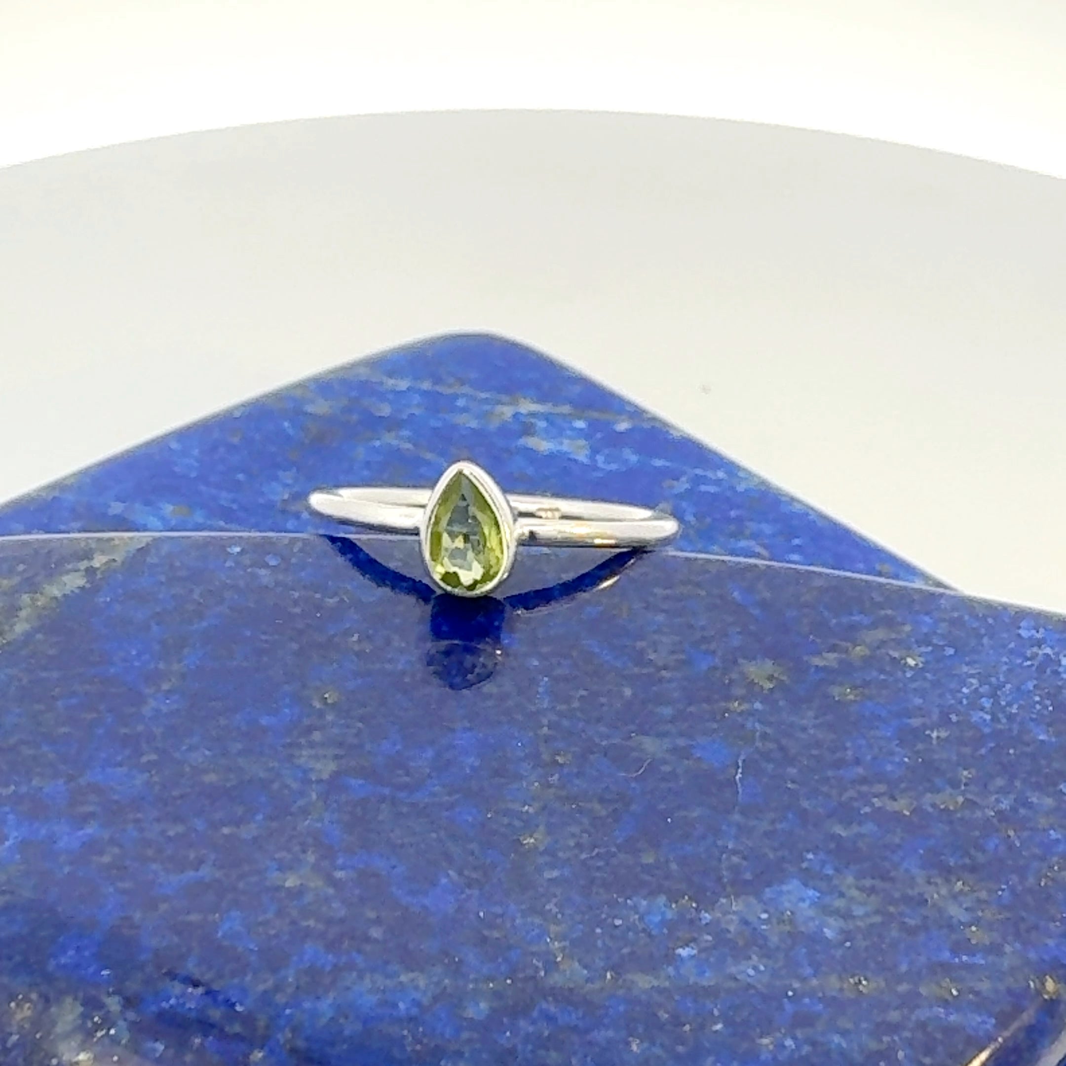 Pear Cut Peridot Ring in Sterling Silver