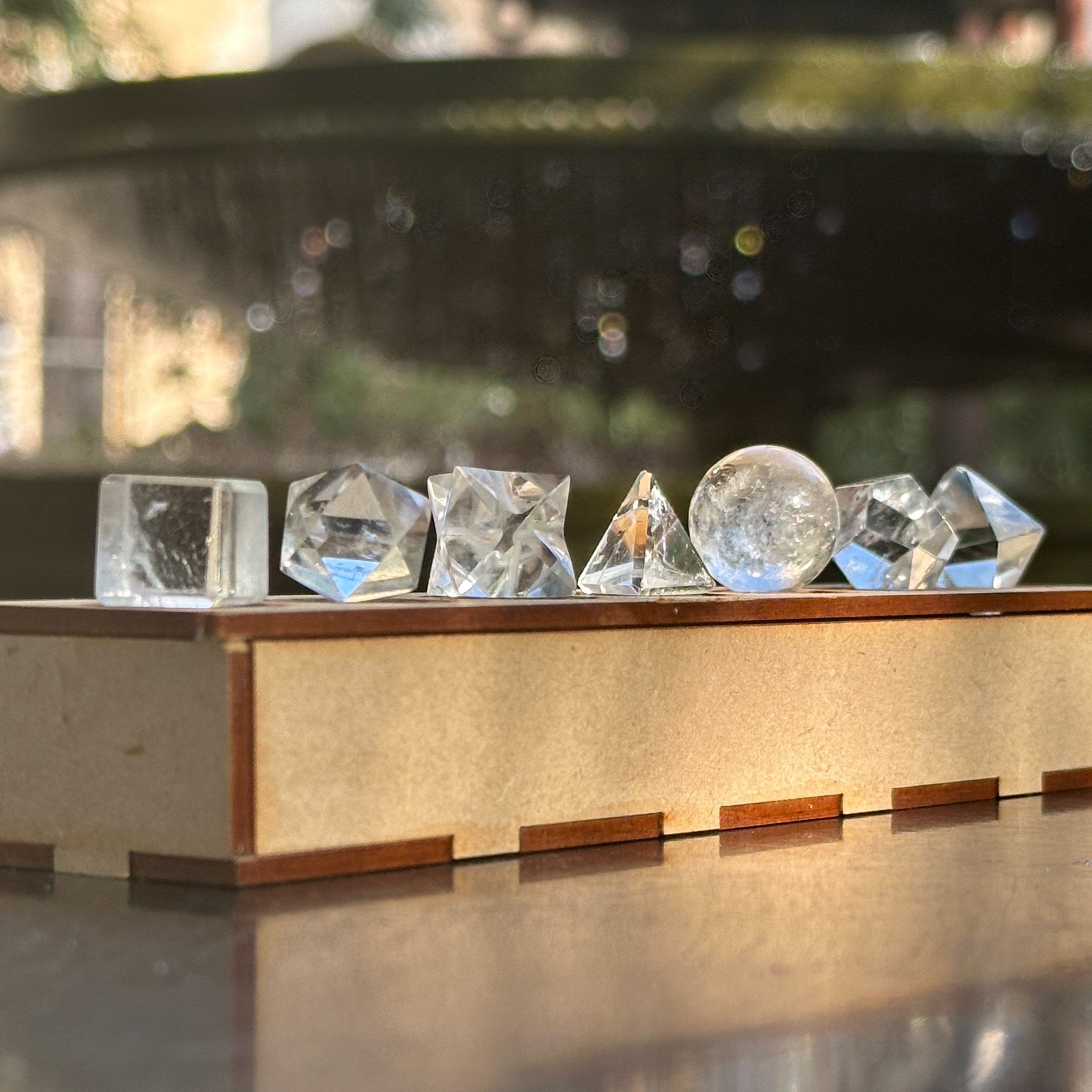 7 Geometric Clear Quartz Carvings